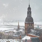 A church and bridge in the snow