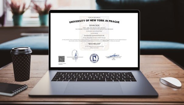 Open laptop with university diploma on screen