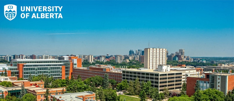 Large university campus buildings in blue sky