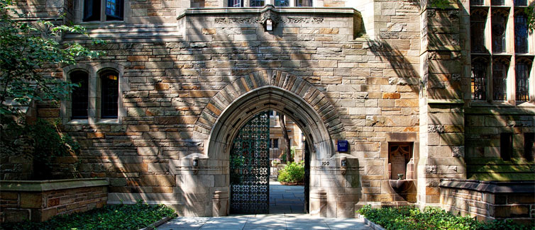 Sandstone wall with a steel gate