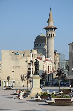 Eastern European city square with statue