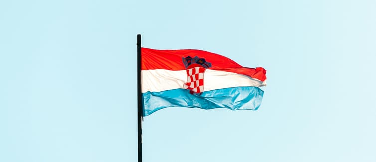 Image of a red, white and blue Croatia flag on a flagpole
