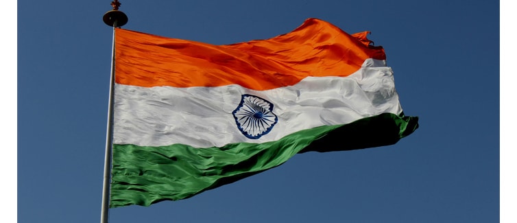 Image of an orange, white and green India flag on a flagpole