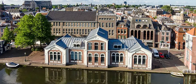 Ornate building sitting next to waterfront