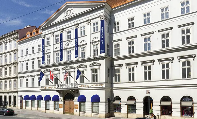 White building with flags